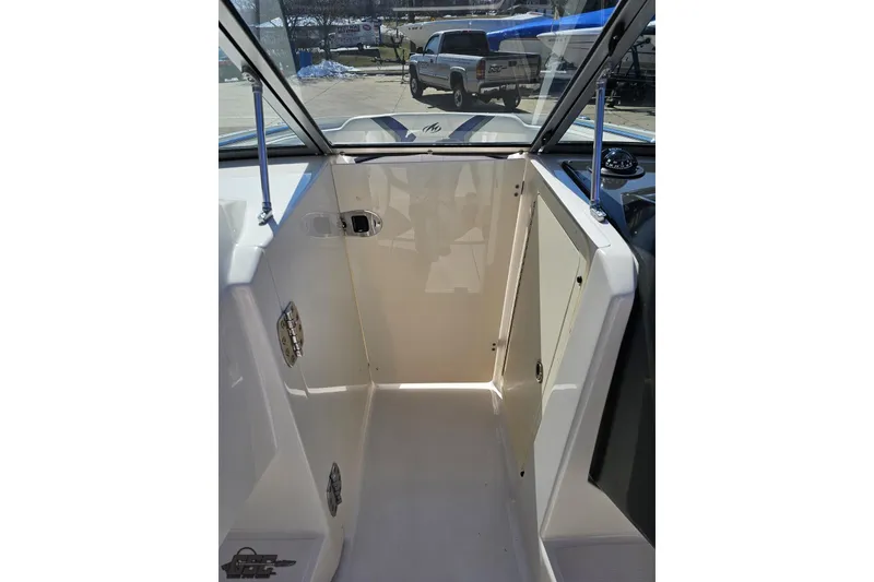 Slide: The Image of Interior view of a 2013 Monterey M3 Sport Boat, showcasing sleek design and spacious cabin. - 67