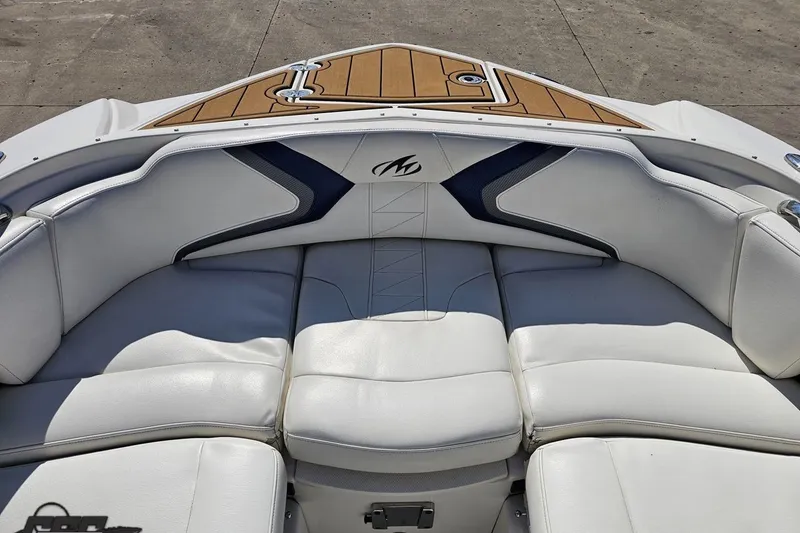 Slide: The Image of Luxurious seating on a 2013 Monterey M3 Sport Boat with sleek white upholstery. - 70