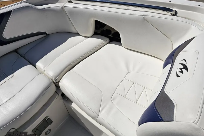 Slide: The Image of White leather seating on a 2013 Monterey M3 Sport Boat, featuring sleek design and comfort. - 71