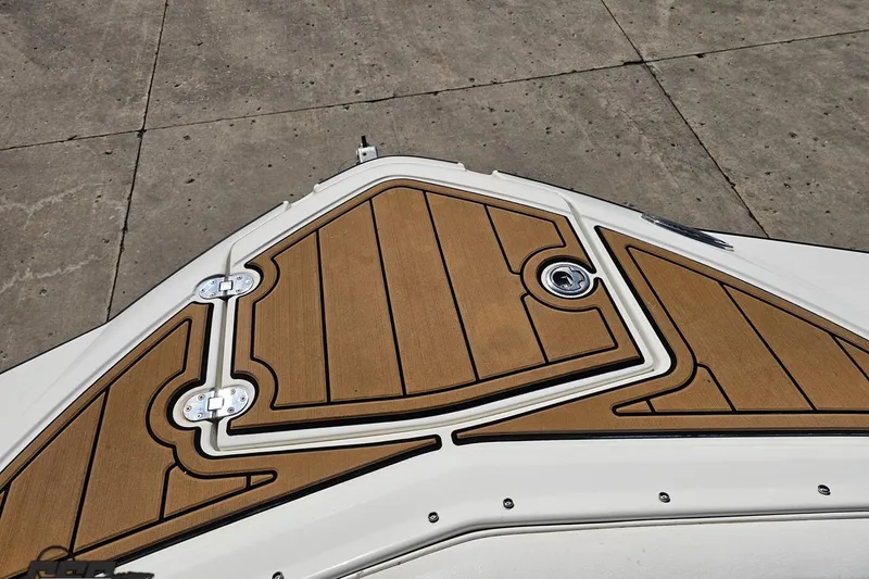 Slide: The Image of 2013 Monterey M3 Sport Boat deck with wood finish on concrete background. - 85