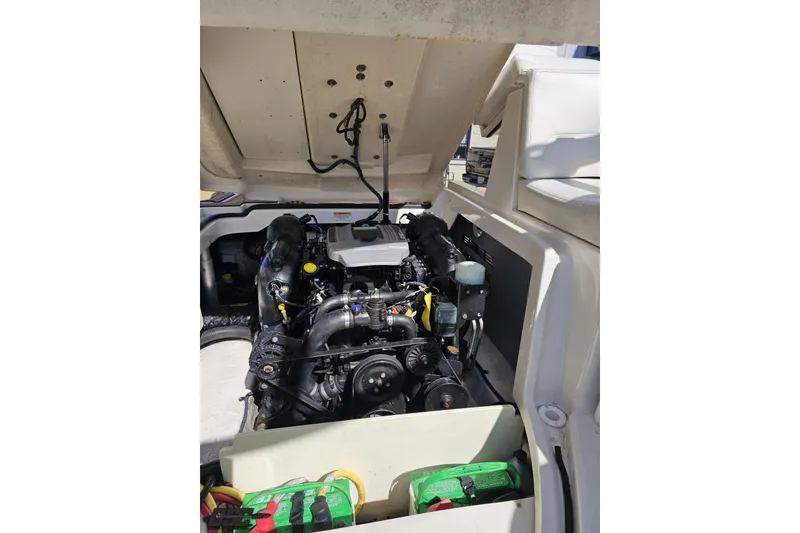 Slide: The Image of Engine compartment of a 2013 Monterey M3 Sport Boat with open hatch. - 98