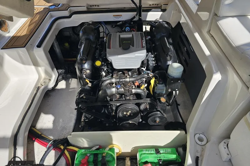 Slide: The Image of Engine compartment of a 2013 Monterey M3 Sport Boat, showcasing detailed mechanical components. - 99