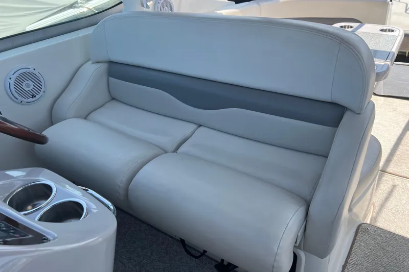 Slide: The Image of 2007 Chaparral Signature 330 boat interior with plush seating and cup holders. - 18
