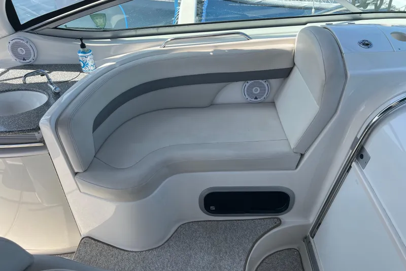 Slide: The Image of 2007 Chaparral Signature 330 boat interior with seating and sink area. - 20