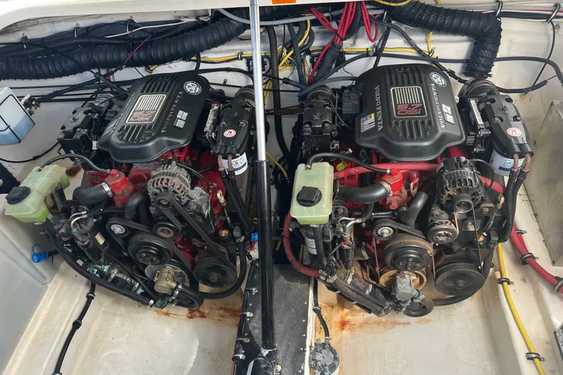 Slide: The Image of Twin engines in a 2007 Chaparral Signature 330 boat, showcasing detailed mechanical components. - 33