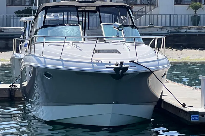 Slide: The Image of 2007 Chaparral Signature 330 yacht docked at marina, front view. - 5