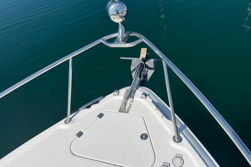 Slide: The Image of Bow of a 2007 Chaparral Signature 330 boat with anchor and railing. - 7