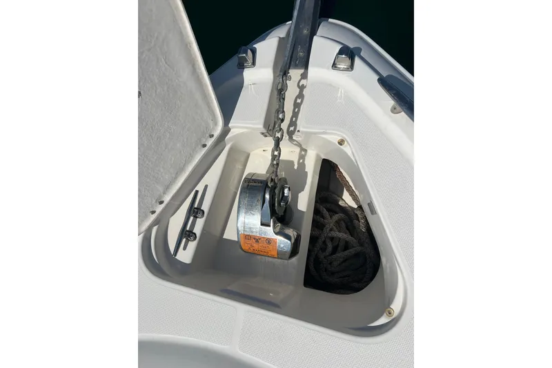 Slide: The Image of Anchor compartment of 2007 Chaparral Signature 330 boat with chain and rope. - 8