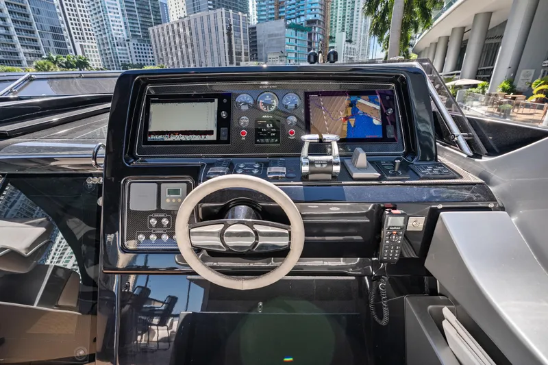 Slide: The Image of Cockpit of 2020 Riva 100' Corsaro yacht with modern navigation equipment. - 11