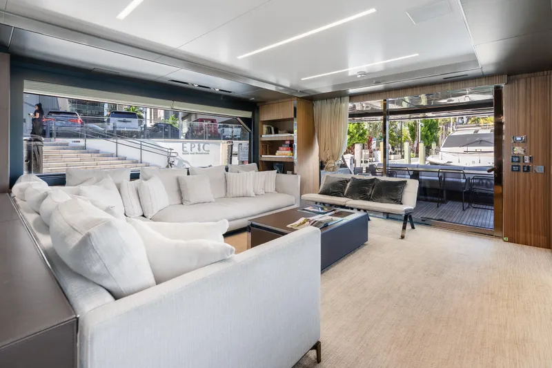 Slide: The Image of Luxurious interior of 2020 Riva 100' Corsaro yacht with elegant seating and modern decor. - 25