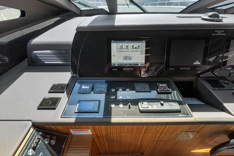 Slide: The Image of Control panel of 2020 Riva 100' Corsaro yacht with advanced navigation systems. - 28