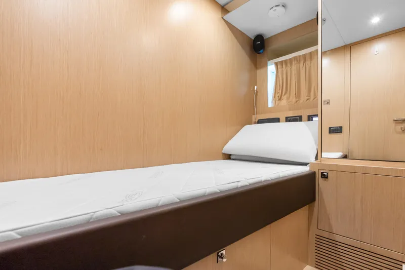 Slide: The Image of Luxurious cabin interior of 2020 Riva 100' Corsaro yacht with modern wood finish. - 31