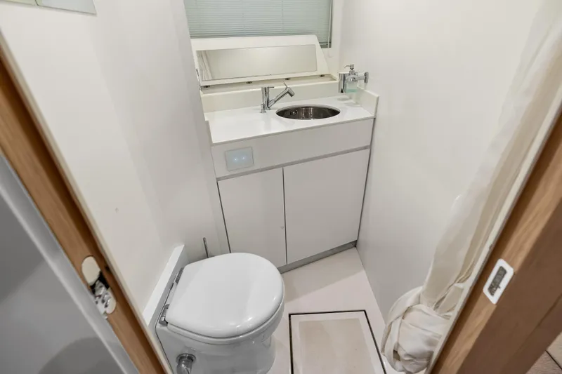 Slide: The Image of Modern bathroom on 2020 Riva 100' Corsaro yacht, featuring sleek fixtures and compact design. - 41