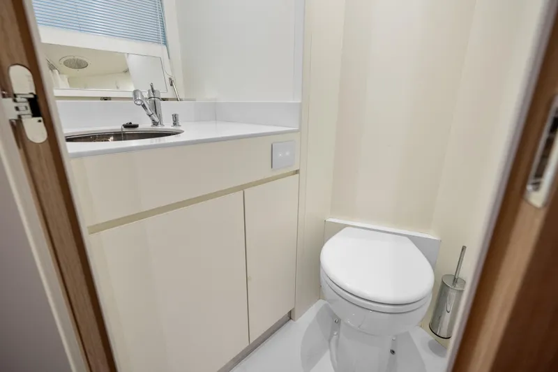 Slide: The Image of Luxurious bathroom on 2020 Riva 100' Corsaro yacht with modern fixtures. - 47