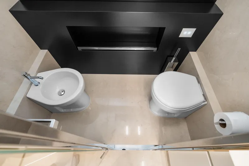 Slide: The Image of Luxurious bathroom on 2020 Riva 100' Corsaro yacht with modern fixtures. - 48