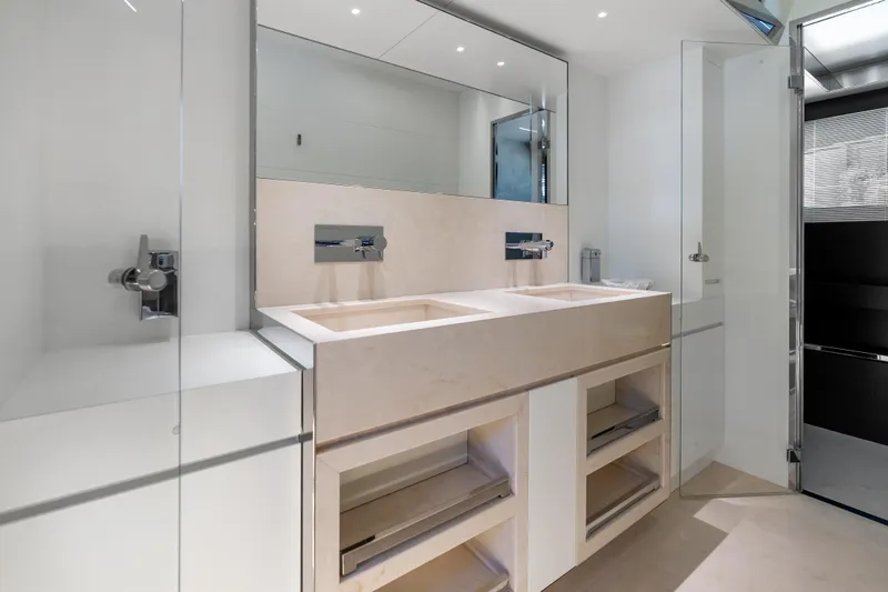 Slide: The Image of Luxurious bathroom in 2020 Riva 100' Corsaro yacht with dual sinks and modern fixtures. - 52