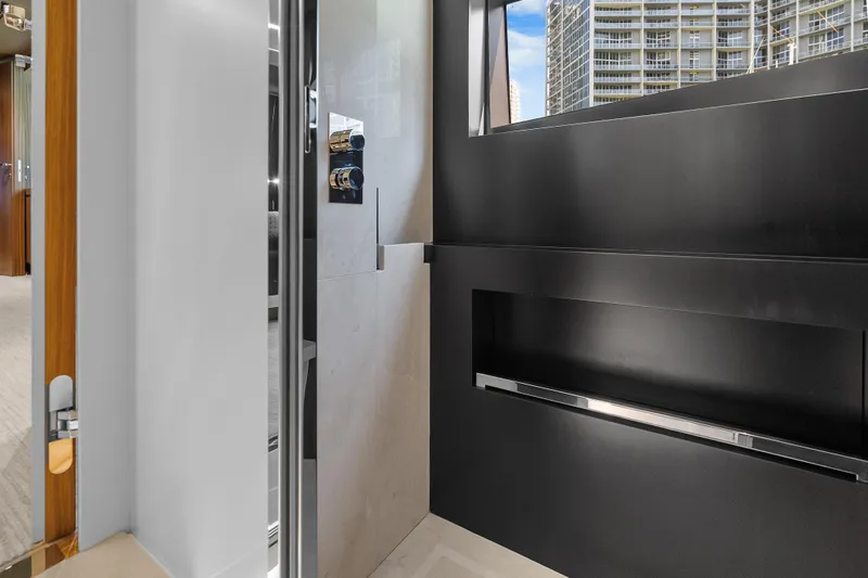 Slide: The Image of Luxurious interior of 2020 Riva 100' Corsaro yacht with modern design elements. - 56