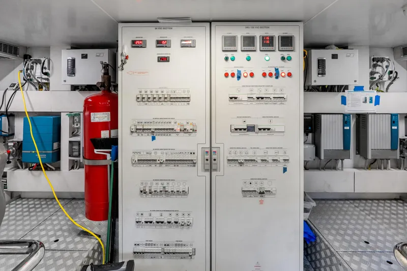 Slide: The Image of Electrical control panel in a 2020 Riva 100' Corsaro yacht engine room. - 71