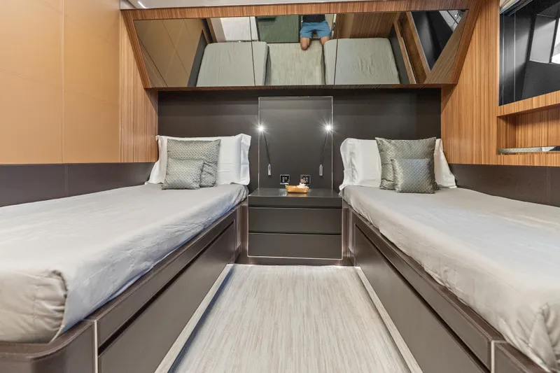 Slide: The Image of Luxurious twin cabin interior on 2020 Riva 100' Corsaro yacht, featuring modern design. - 74