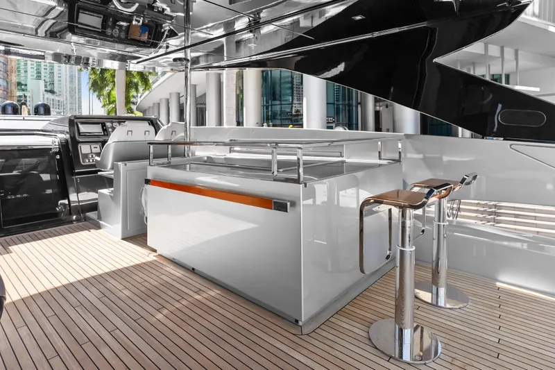 Slide: The Image of Luxurious deck of 2020 Riva 100' Corsaro yacht with modern seating and sleek design. - 8
