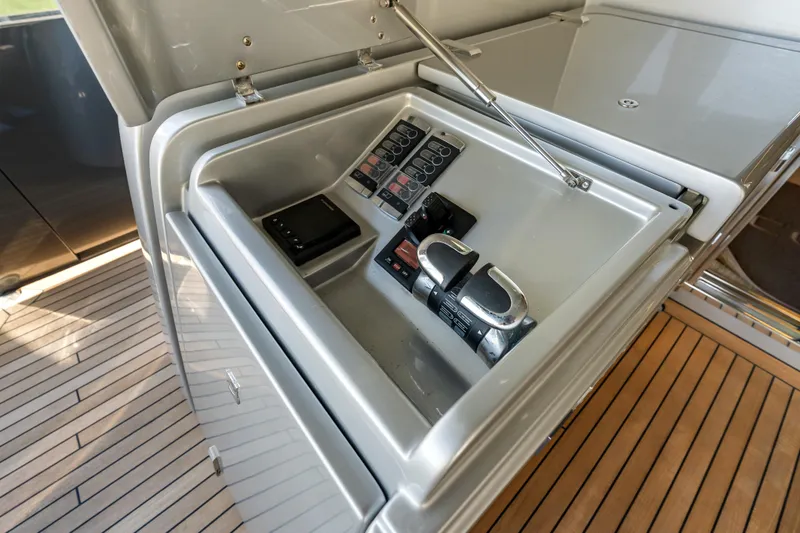 Slide: The Image of Control panel of 2020 Riva 100' Corsaro yacht with sleek design and modern features. - 83