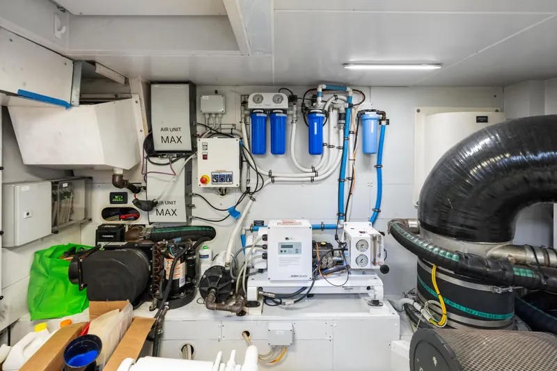 Slide: The Image of Engine room of 2020 Riva 100' Corsaro yacht with air units and filtration system. - 90