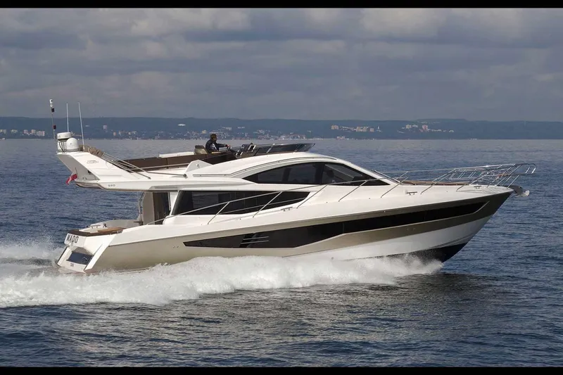 The Image of Manufacturer Provided Image: 2019 Galeon 550 Fly yacht cruising on open water. - 0