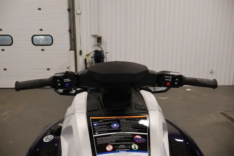 Slide: The Image of 2026 Yamaha WaveRunner VX Cruiser HO handlebars in a garage setting. - 10
