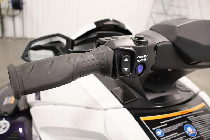 Slide: The Image of Handlebar controls of 2026 Yamaha WaveRunner VX Cruiser HO, featuring cruise and no wake buttons. - 12