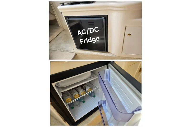 Slide: The Image of AC/DC fridge in 2001 Sea Ray Sundancer 260, stocked with beverages. - 27