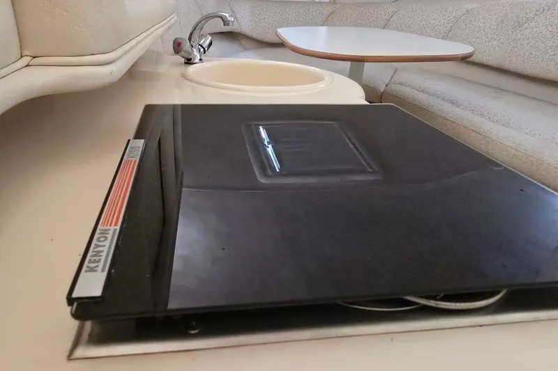 Slide: The Image of Interior of 2001 Sea Ray Sundancer 260 with Kenyon stove and sink. - 28