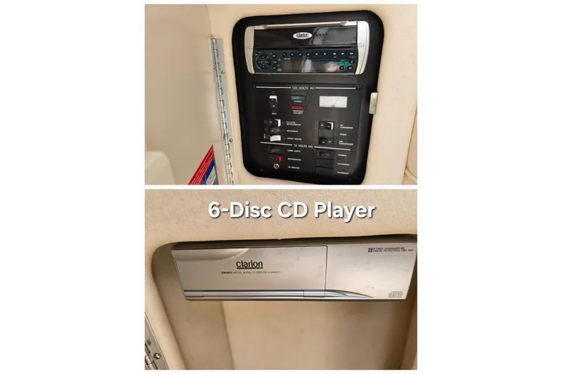Slide: The Image of 2001 Sea Ray Sundancer 260 control panel and Clarion 6-disc CD player. - 35