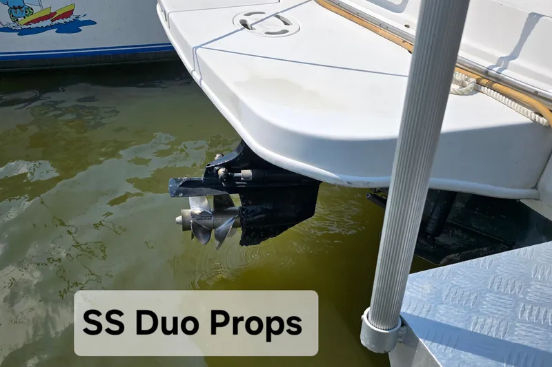 Slide: The Image of 2001 Sea Ray Sundancer 260 with SS Duo Props in water. - 9