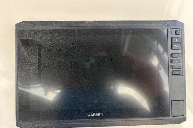 Slide: The Image of Garmin marine GPS device on 2024 Carolina Skiff 25 LS boat dashboard. - 14