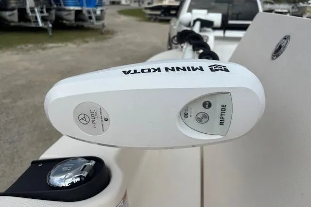 Slide: The Image of Minn Kota Riptide motor on 2024 Carolina Skiff 25 LS boat. - 26