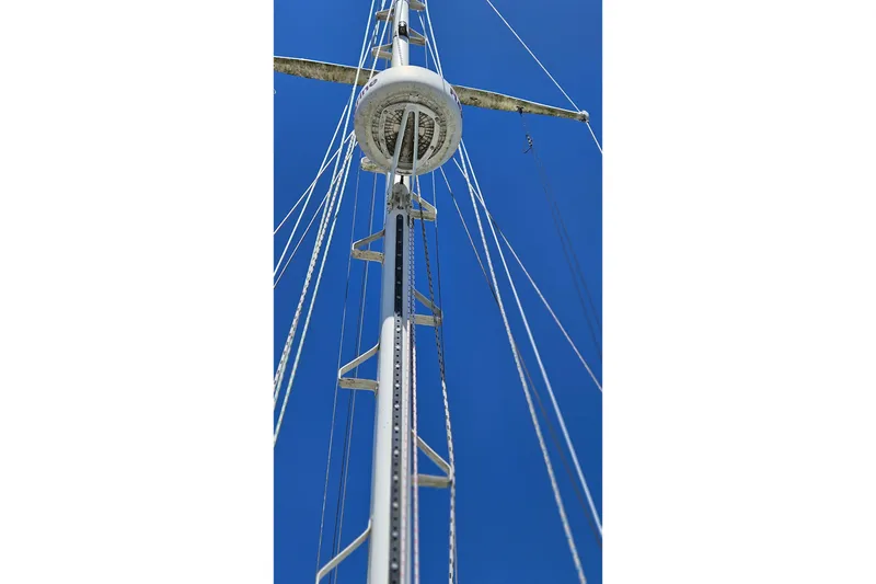 Slide: The Image of 1989 Pacific Seacraft 37 sailboat deck with railing and portholes. - 11