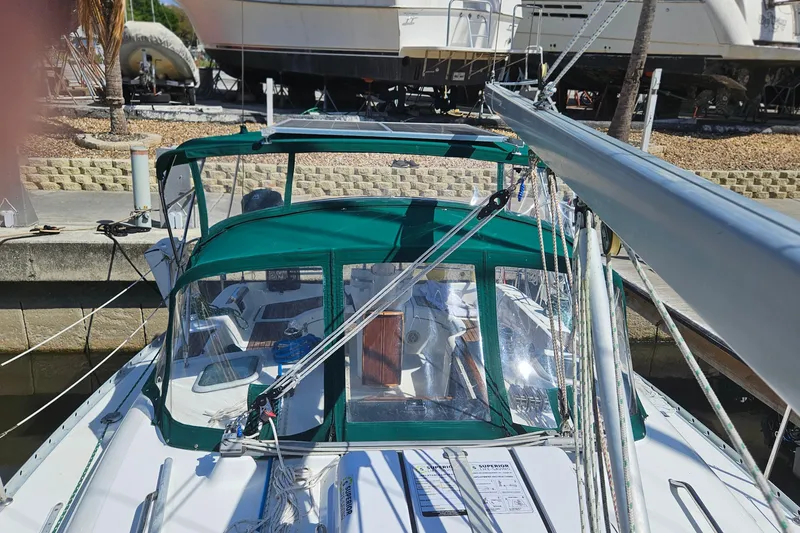 Slide: The Image of Cockpit view of 2000 Beneteau Oceanis Clipper 361 sailboat with ropes and winches. - 14