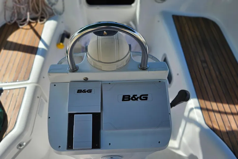 Slide: The Image of Cockpit of 2000 Beneteau Oceanis Clipper 361 with wooden table and steering wheel. - 21
