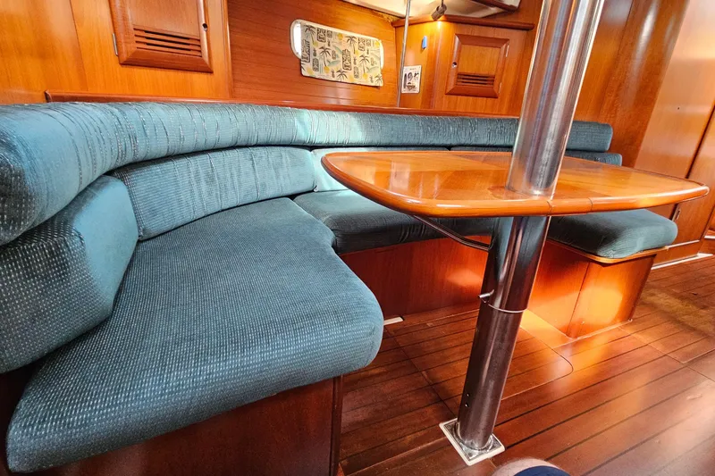 Slide: The Image of Control panel of a 2000 Beneteau Oceanis Clipper 361 yacht with various switches and devices. - 34