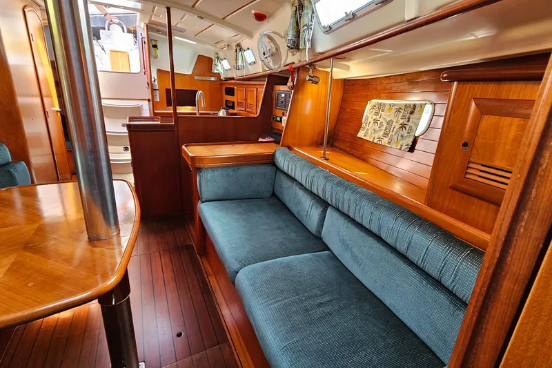 Slide: The Image of Cozy cabin interior of 2000 Beneteau Oceanis Clipper 361 sailboat with wooden finish. - 37