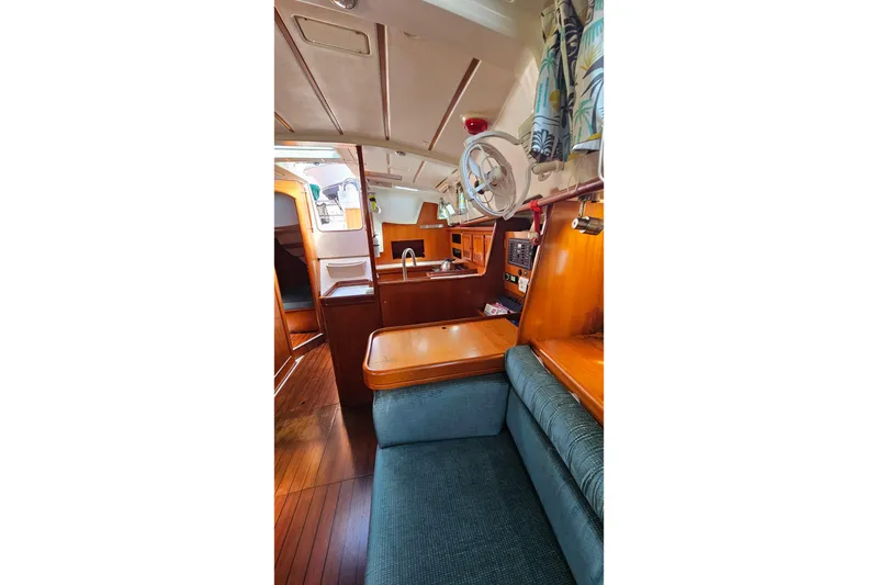 Slide: The Image of Beneteau Oceanis Clipper 361 (2000) yacht interior with open storage compartment. - 45