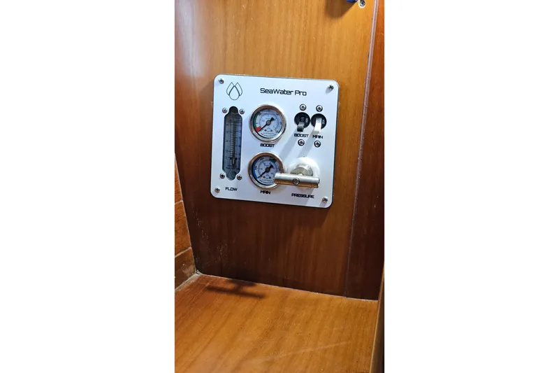 Slide: The Image of Safety equipment on Beneteau Oceanis Clipper 361 yacht, featuring fire extinguisher and emergency beacon. - 48