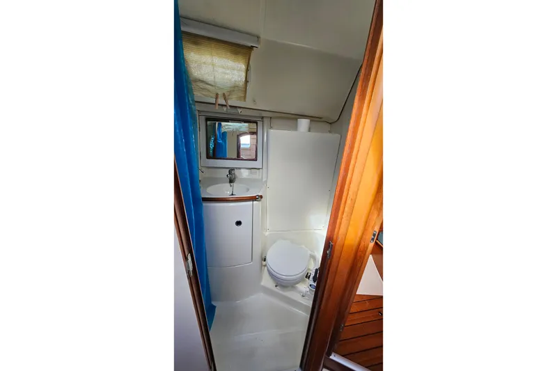 Slide: The Image of Electrical wiring inside a 2000 Beneteau Oceanis Clipper 361 yacht, showcasing detailed components. - 51