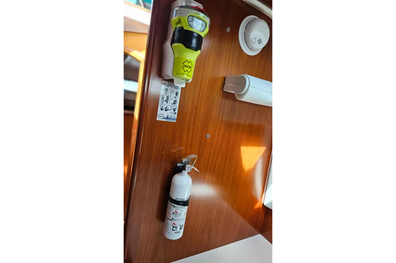 Slide: The Image of Engine compartment of a 2000 Beneteau Oceanis Clipper 361 sailboat, showing wiring and hoses. - 53