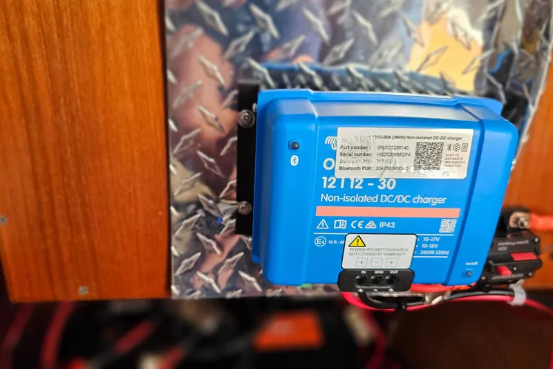 Slide: The Image of Inflatable liferaft on 2000 Beneteau Oceanis Clipper 361 sailboat deck, secured with straps. - 63