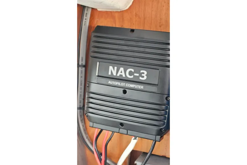 Slide: The Image of Bilge area of a 2000 Beneteau Oceanis Clipper 361 sailboat, showing hoses and wiring. - 66