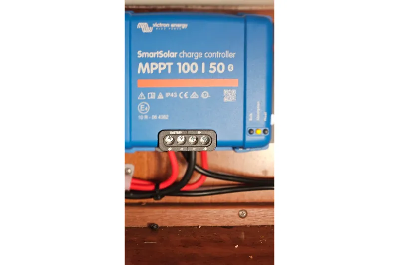 Slide: The Image of Bilge area of a 2000 Beneteau Oceanis Clipper 361 sailboat, showing hoses and wiring. - 68