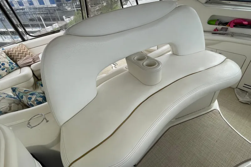 Slide: The Image of Cockpit of 2000 Sea Ray Sundancer 460 with steering wheel and navigation instruments. - 32