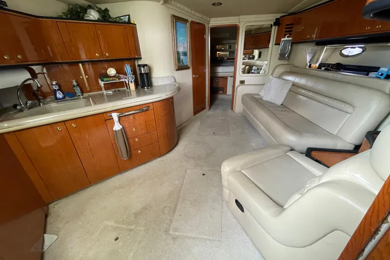 Slide: The Image of Luxurious cabin interior of 2000 Sea Ray Sundancer 460 yacht with cozy bedding. - 43