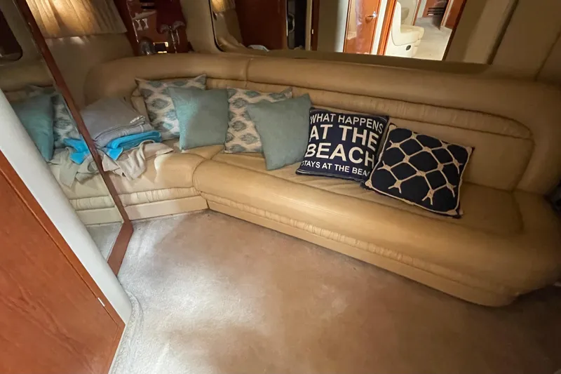 Slide: The Image of Luxurious interior of a 2000 Sea Ray Sundancer 460 yacht with beige leather seating. - 47